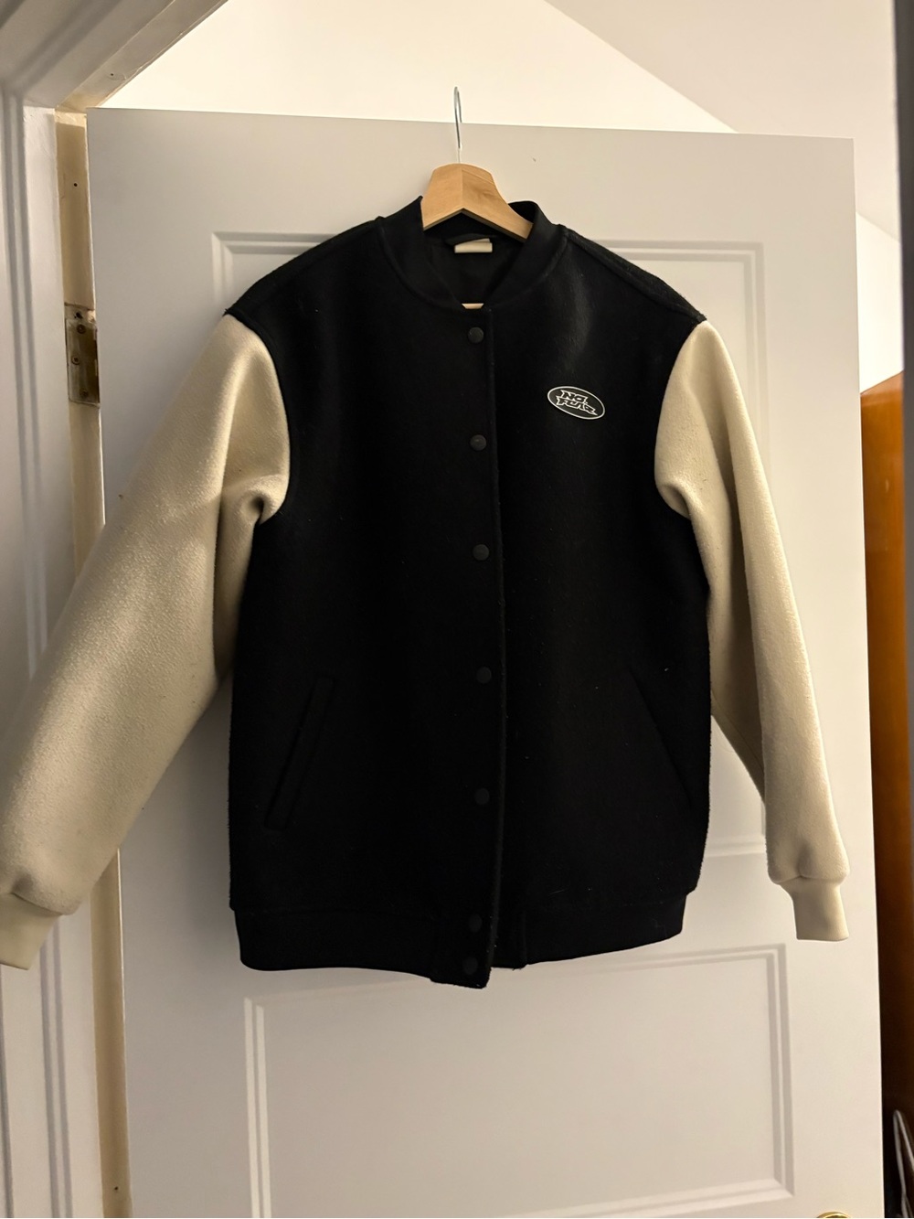 H&M Black Body with Cream Sleeve Varsity Jacket